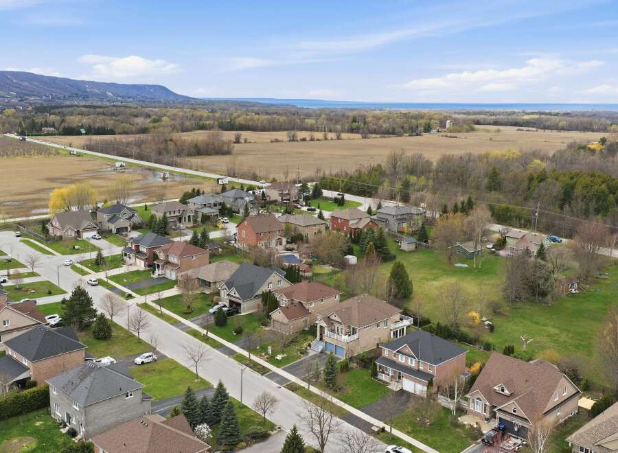 Discover the charm of suburban living in this stunning aerial view.