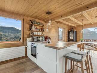 Experience the epitome of alpine living in this stunning kitchen.