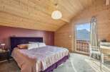 Experience the ultimate in alpine luxury with this stunning bedroom.