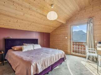 Experience the ultimate in alpine luxury with this stunning bedroom.