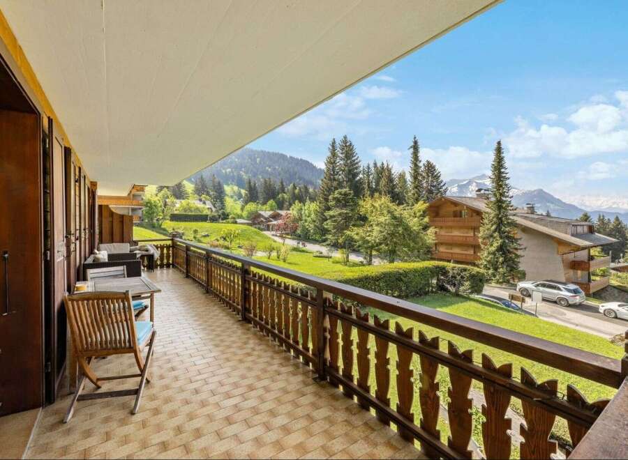 Enjoy breathtaking mountain views from this stunning balcony.