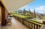 Enjoy breathtaking mountain views from this stunning balcony.