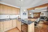 Discover the charm of this stunning property, featuring a beautifully designed kitchen with modern appliances and ample counter space.