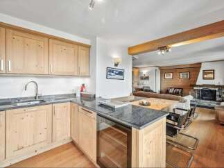 Discover the charm of this stunning property, featuring a beautifully designed kitchen with modern appliances and ample counter space.
