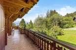 Enjoy breathtaking mountain views from this charming balcony.