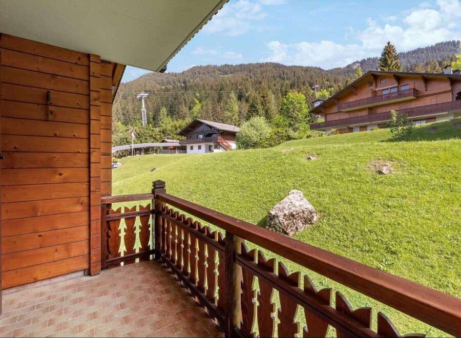 Enjoy breathtaking mountain views from this charming chalet-style property.