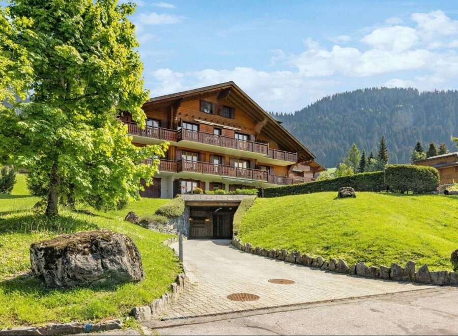 Discover the charm of this stunning wooden chalet nestled in a picturesque mountain setting.