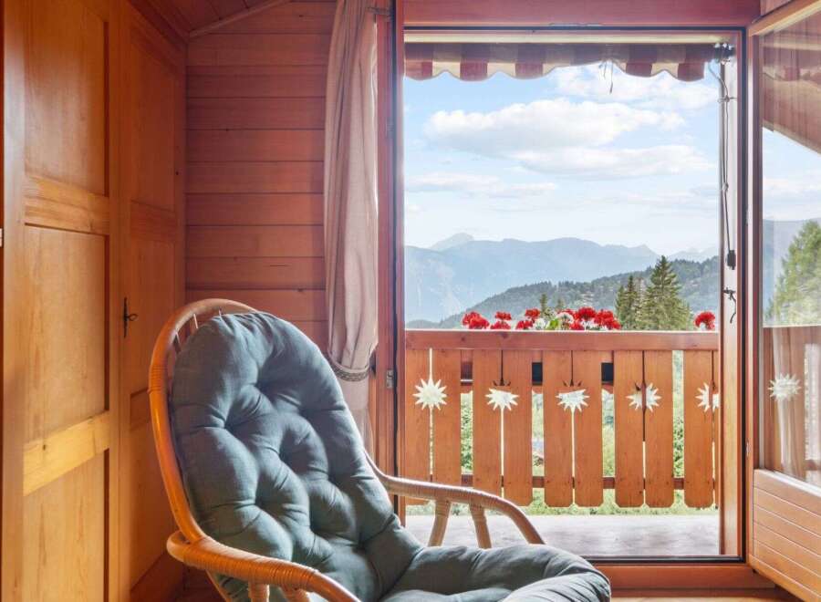 Enjoy breathtaking mountain views from this charming property.