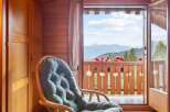 Enjoy breathtaking mountain views from this charming property.