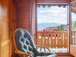 Enjoy breathtaking mountain views from this charming property.