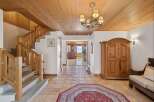 Step into luxury with this stunning property featuring a grand entrance and a beautiful staircase.