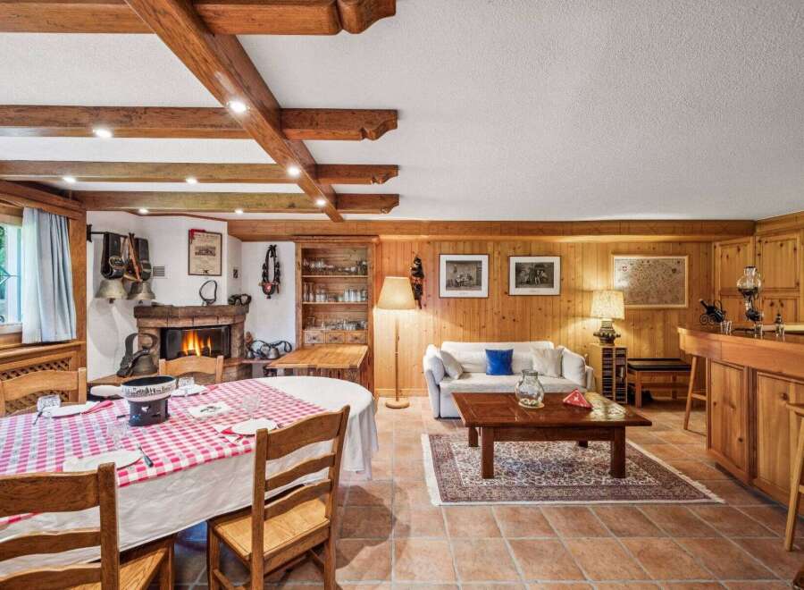 Step into a cozy retreat with this charming property, featuring a rustic interior design.