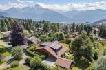 Discover your dream home nestled in the heart of nature, offering breathtaking mountain views and a serene atmosphere.