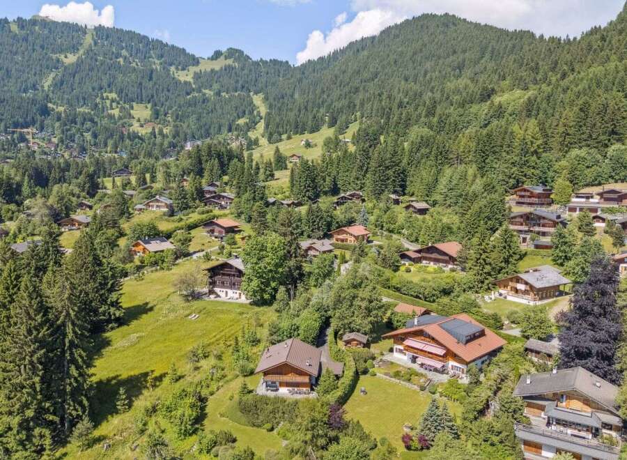 Nestled in a picturesque mountain landscape, this property offers a serene retreat.