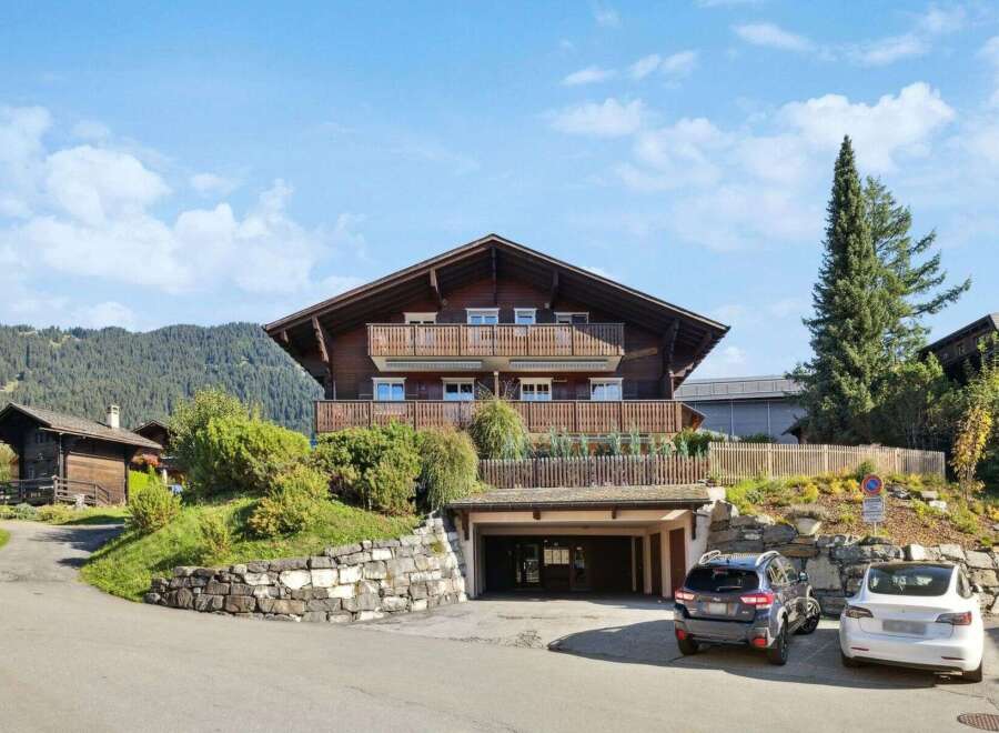 This stunning chalet-style home offers a blend of rustic charm and modern convenience.