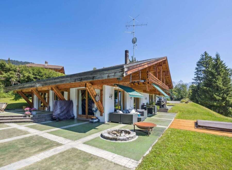 Discover the epitome of alpine living in this stunning property, boasting a unique architectural design with exposed wooden beams and a charming facade.