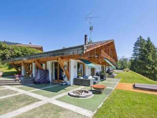 Discover the epitome of alpine living in this stunning property, boasting a unique architectural design with exposed wooden beams and a charming facade.