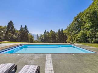 Enjoy the ultimate luxury with this stunning property featuring a pristine swimming pool.