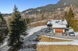 Nestled in a picturesque mountain setting, this stunning property offers a serene escape.
