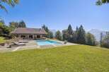 Experience luxury living in this stunning property featuring a private pool and breathtaking mountain views.