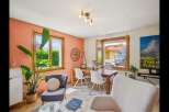 This charming property boasts a bright and airy living space, perfect for relaxation and entertaining.
