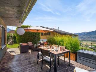 Enjoy outdoor dining and relaxation in this stunning property.