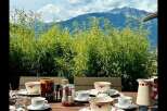 Enjoy breathtaking mountain views from this charming property.
