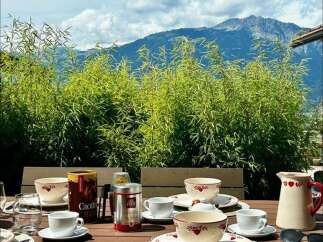Enjoy breathtaking mountain views from this charming property.