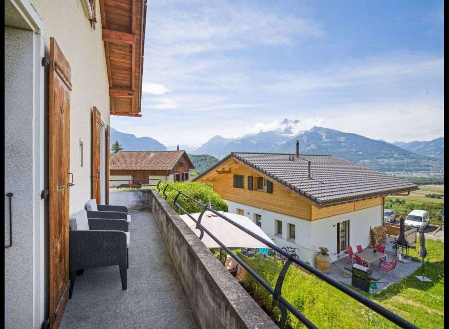 Enjoy breathtaking mountain views from this charming property.