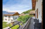 Enjoy stunning views from this charming property! This home features a balcony with comfortable seating, perfect for relaxing and taking in the scenery.