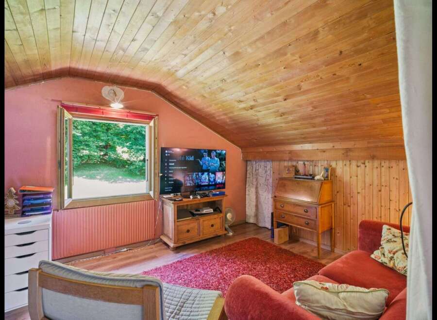 Step into this cozy and inviting living space, perfect for relaxation and entertainment.