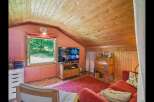 Step into this cozy and inviting living space, perfect for relaxation and entertainment.