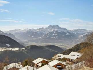Nestled in the heart of the mountains, this stunning property offers breathtaking views of the snow-capped peaks.