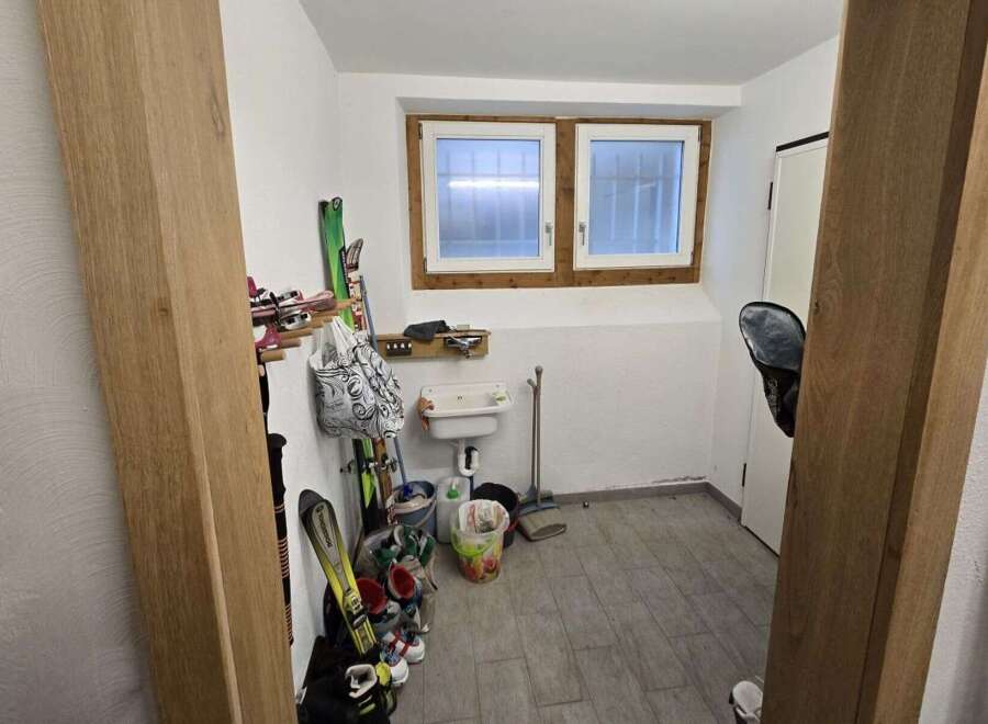 Discover this charming property featuring a functional mudroom, perfect for storing outdoor gear.