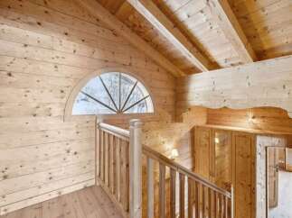 Step into a world of rustic charm with this stunning wooden interior.