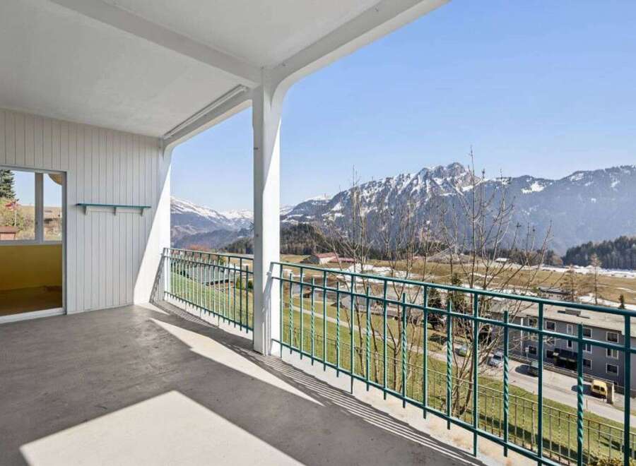 Enjoy breathtaking mountain views from this stunning balcony.
