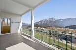 Enjoy breathtaking mountain views from this stunning balcony.