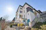 Discover this stunning property featuring a multi-story building with a modern design and ample natural light.