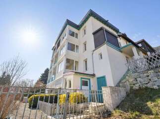 Discover this stunning property featuring a multi-story building with a modern design and ample natural light.