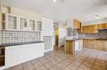 Discover this charming kitchen with ample storage and a bright, airy feel.
