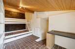 Discover this charming property featuring a cozy bunk bed setup, perfect for maximizing space.