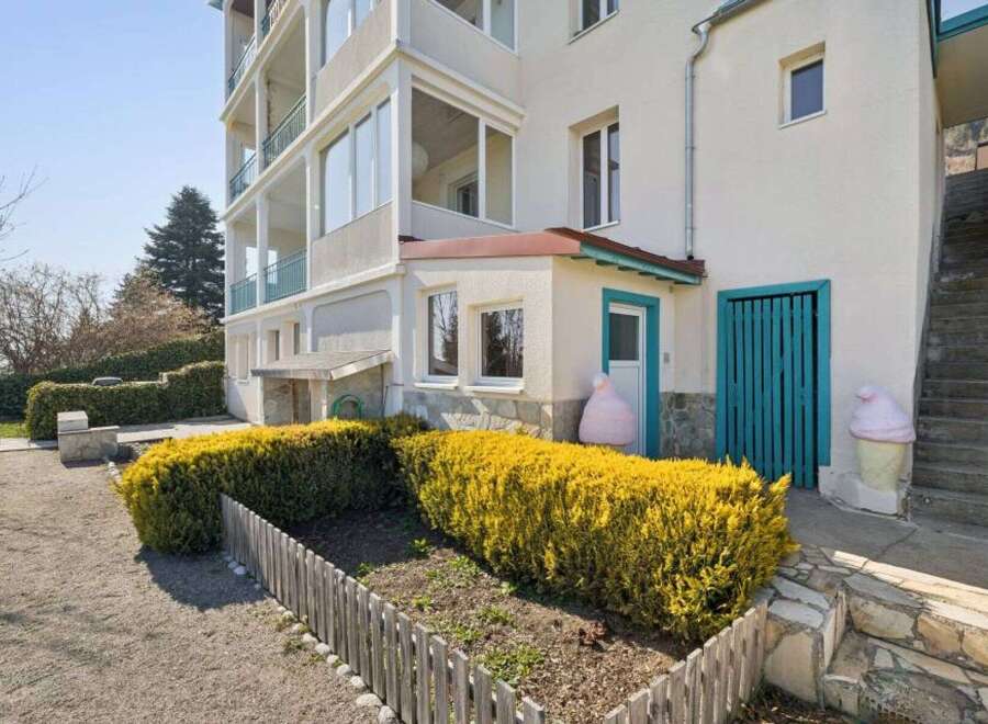 Discover this charming property featuring a unique architectural design and a well-maintained exterior.