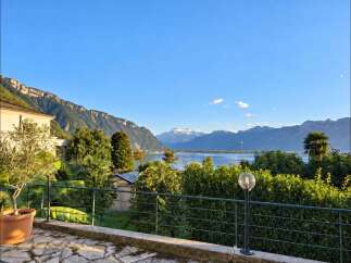Experience breathtaking lake and mountain views from this stunning property, perfect for those seeking tranquility and natural beauty.