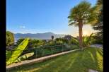Experience breathtaking sunset views over the lake and mountains from this stunning property.
