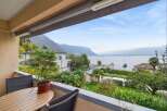 Enjoy breathtaking views from this stunning property! This home features a private balcony overlooking a serene lake and lush greenery.