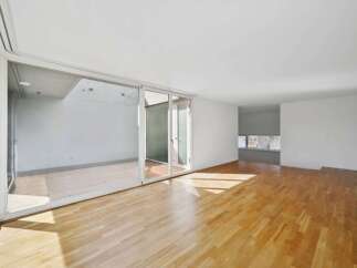 This stunning property boasts a bright and airy interior, perfect for modern living.