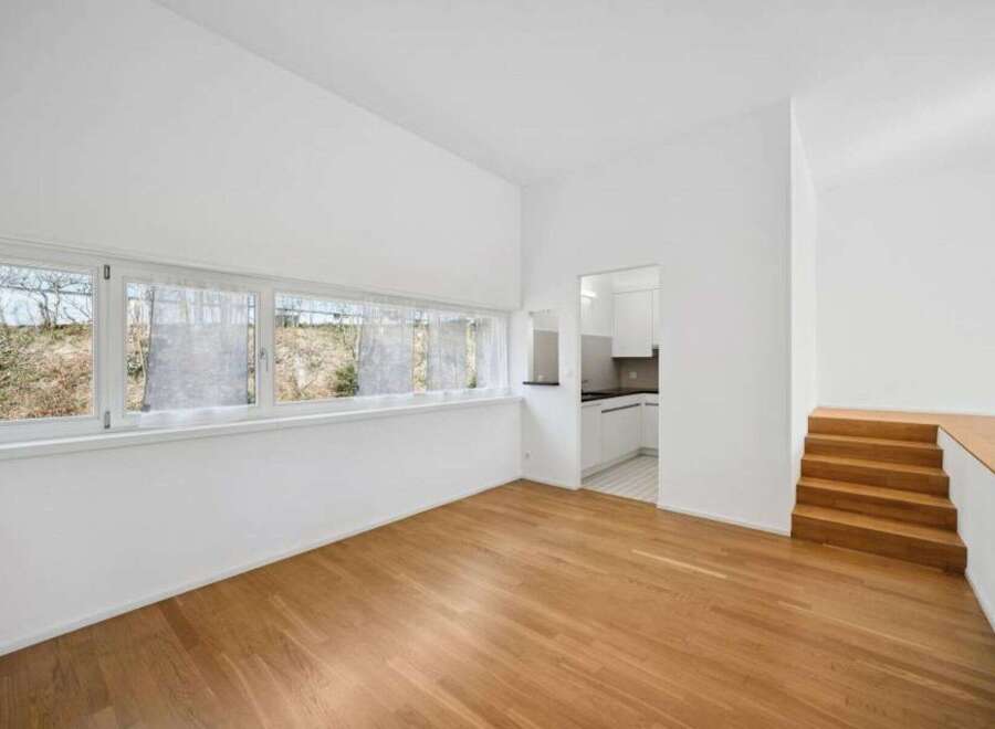 This stunning property boasts a bright and airy living space, perfect for modern living.
