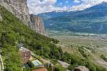 Experience breathtaking panoramic views from this stunning property nestled against a dramatic cliff face.
