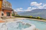 Experience luxury living with this stunning property featuring a private hot tub and swimming pool, perfect for relaxation and entertainment.