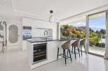 Experience luxury living in this stunning kitchen with a modern design.